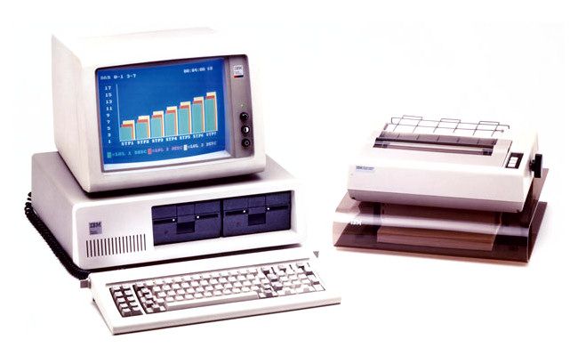 The IBM PC with a printer.