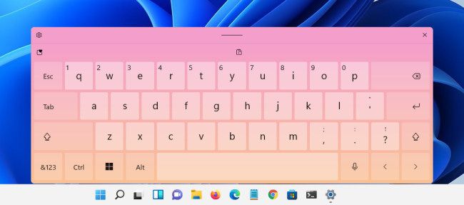 The "Pink-Orange" touch keyboard theme in Windows 11.