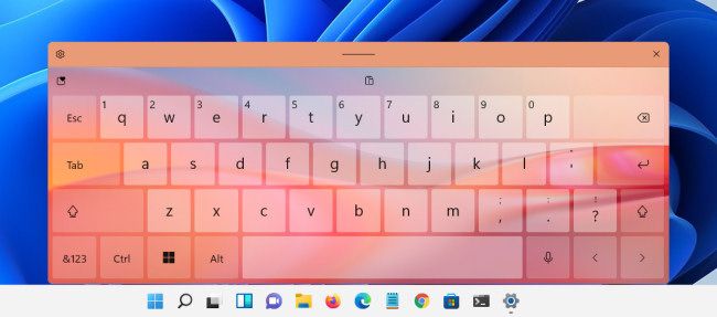 The "Tangerine Tides" touch keyboard theme in Windows 11.