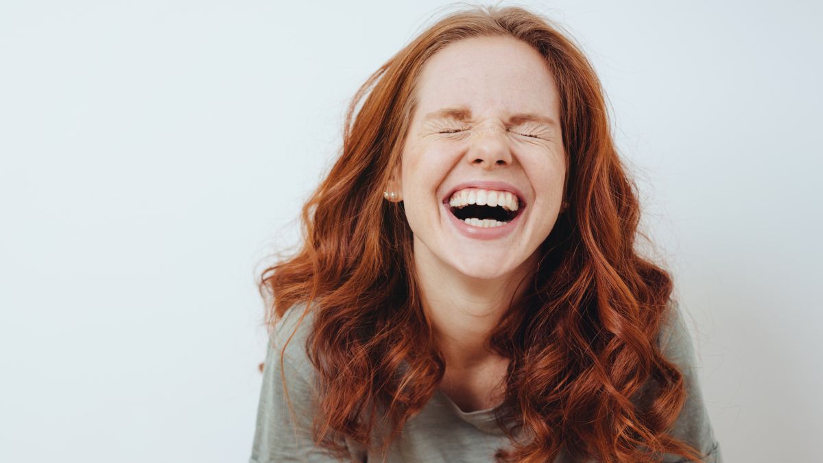 Woman laughing hysterically