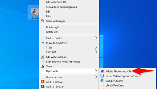Right-click a photo in file manager and select Open With > Adobe Photoshop.