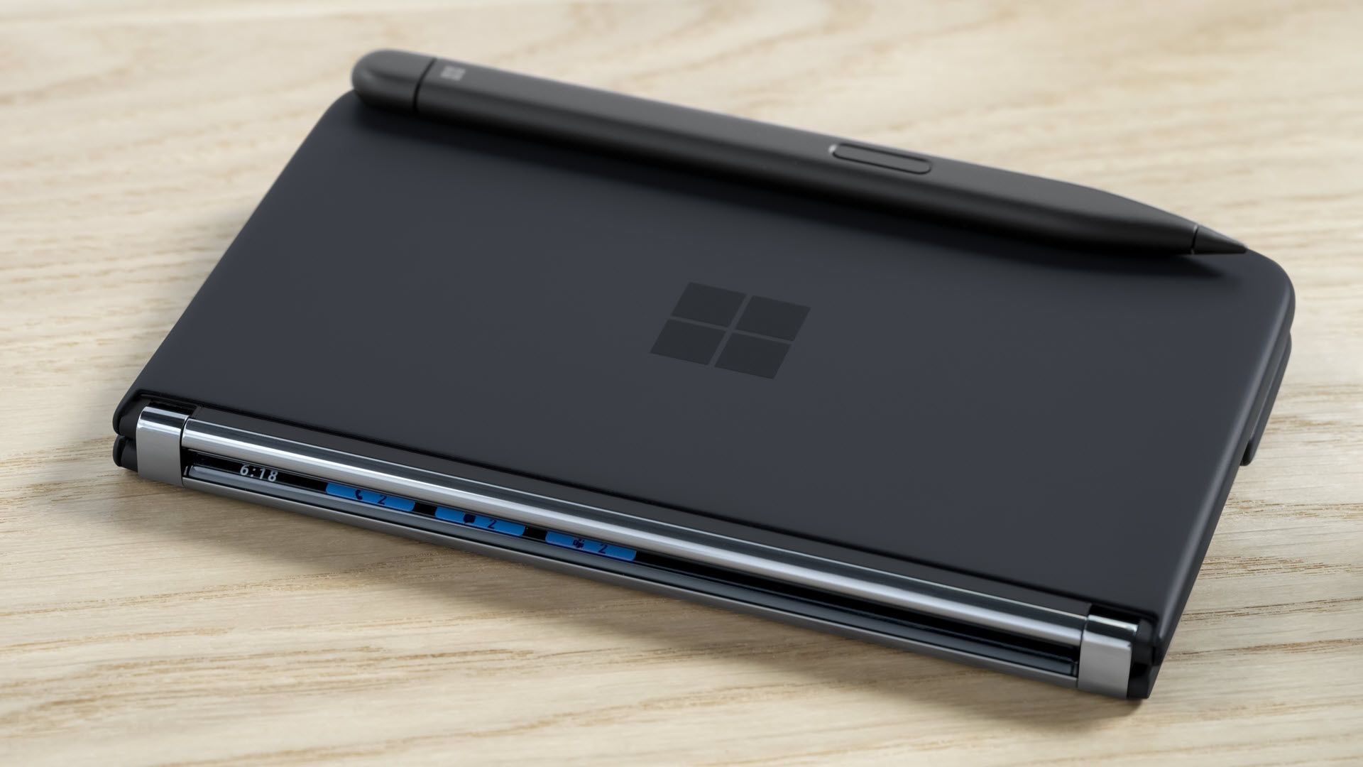 A Surface Duo 2 with a magnetically attached Pen.