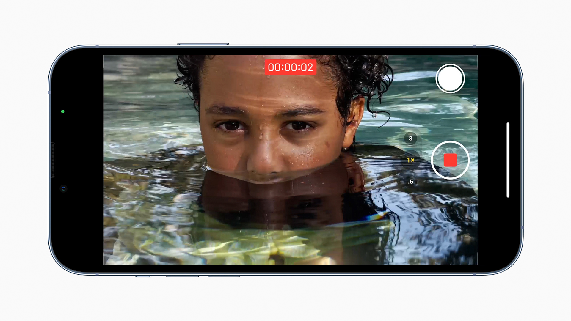 The iPhone 13 Pro recording 4K video.