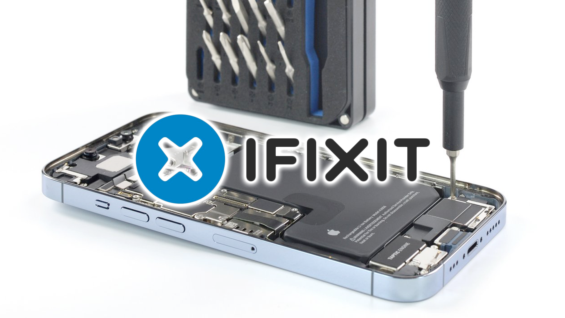 The inside of an iPhone 13 with the iFixit logo.
