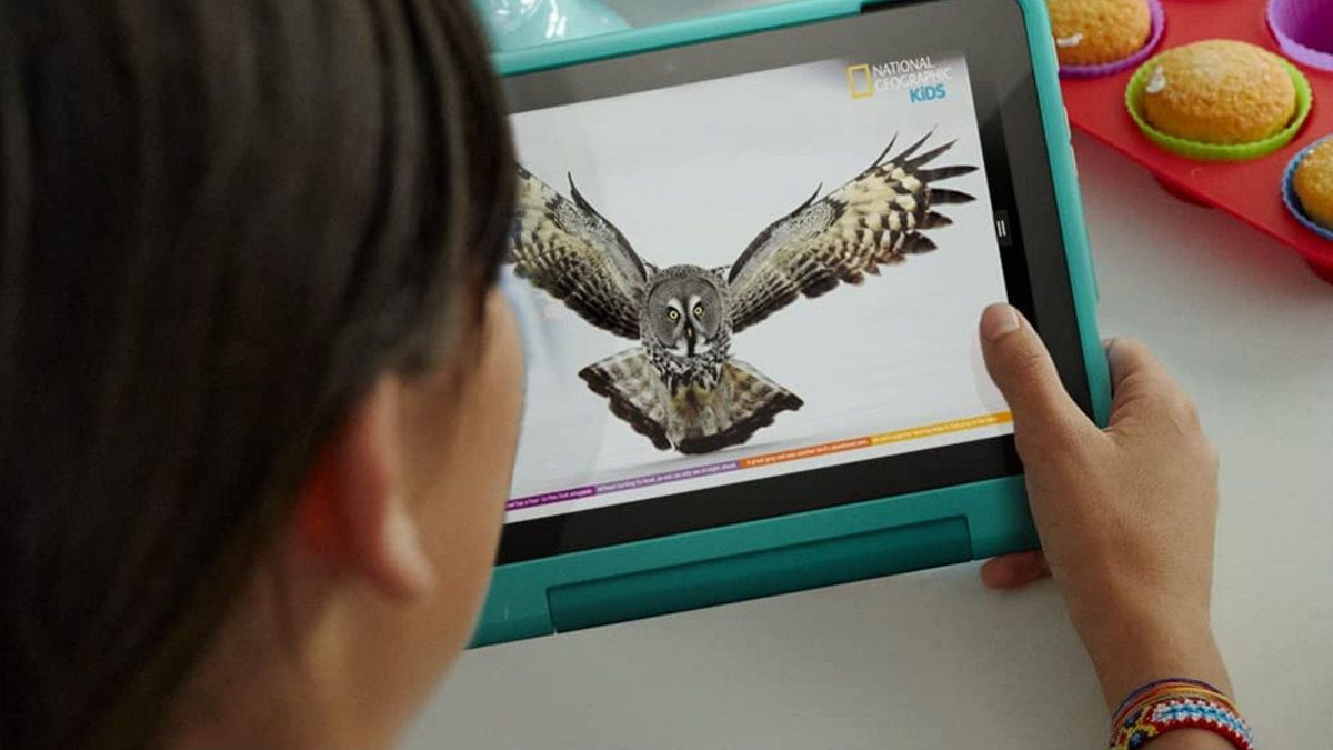 Child using Amazon kids table to watch nature show