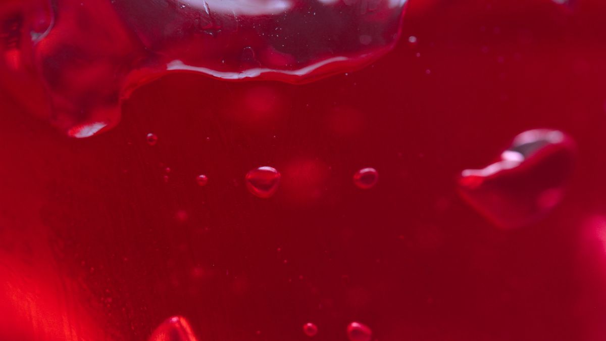 Texture of red jelly with air bubbles