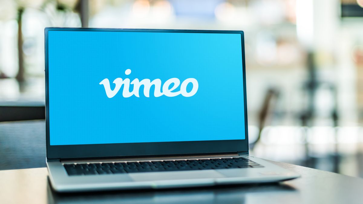 Open laptop displaying Vimeo logo