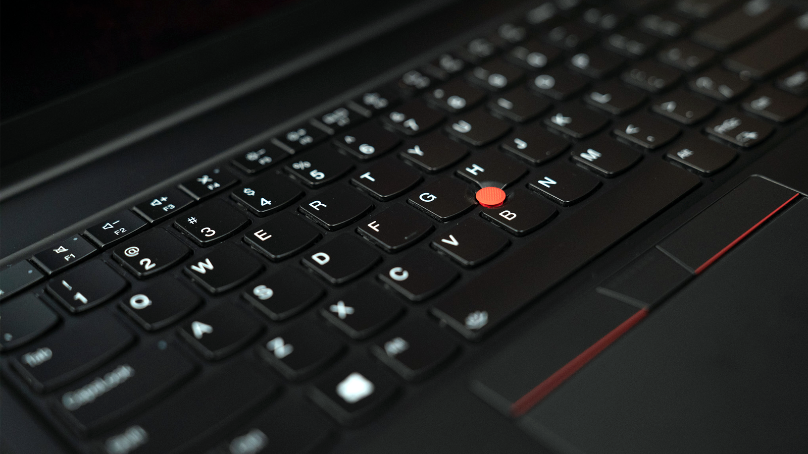 Close-up on the Lenovo Gen 4 laptop's keyboard and TrackPoint nub