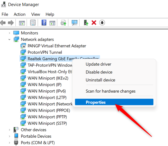 The device manager in Windows 11 with a red arrow pointing to the properties option for a network controller.