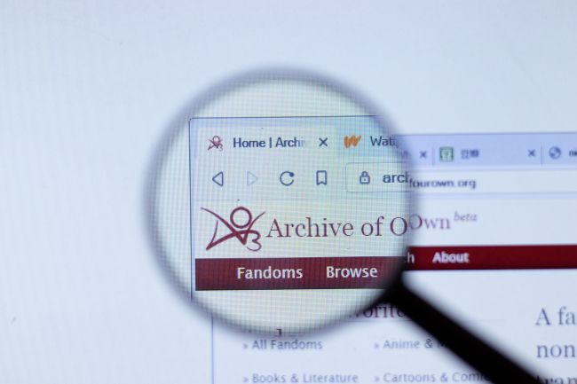 Magnifying glass over the Archive of Our Own website logo