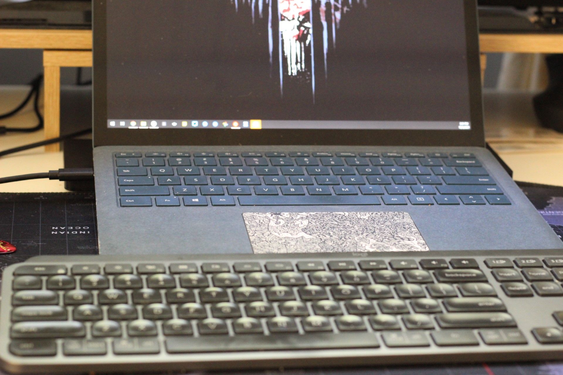 The dock hooked to a 13-inch Surface Laptop 3