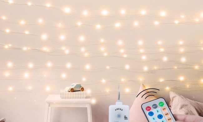 fairy lights hang up on wall