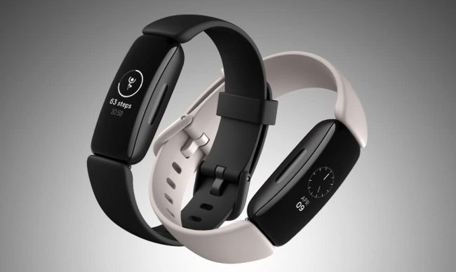 Fitbit Inspire 2s on grey background