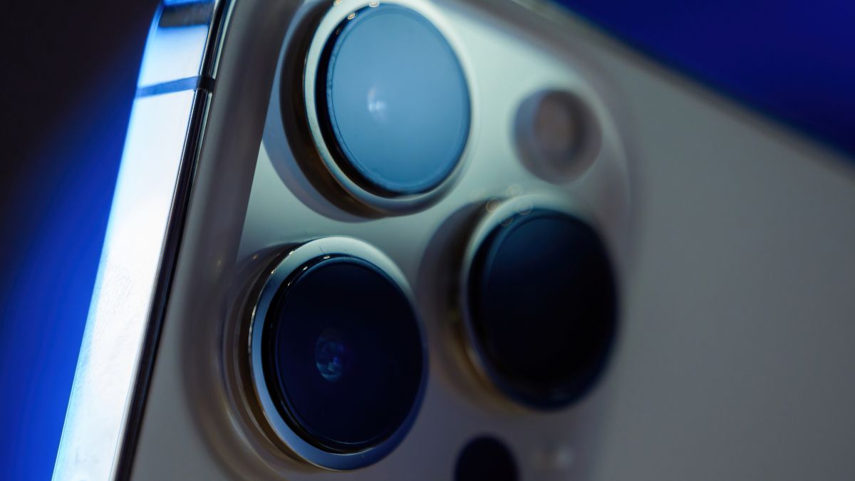 Closeup of the camera lenses on the back of an iPhone 13 Pro