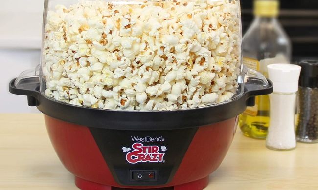 Stir Crazy popcorn machine on table