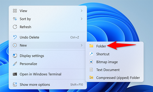 Right-click on the desktop and select New > Folder.