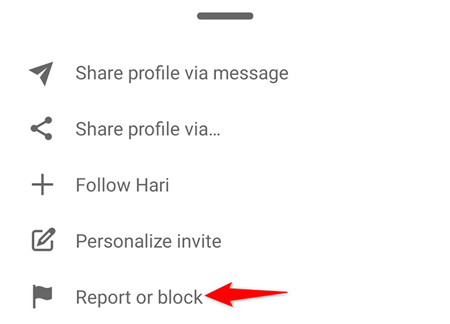 Tap "Report or Block" in the three dots menu.
