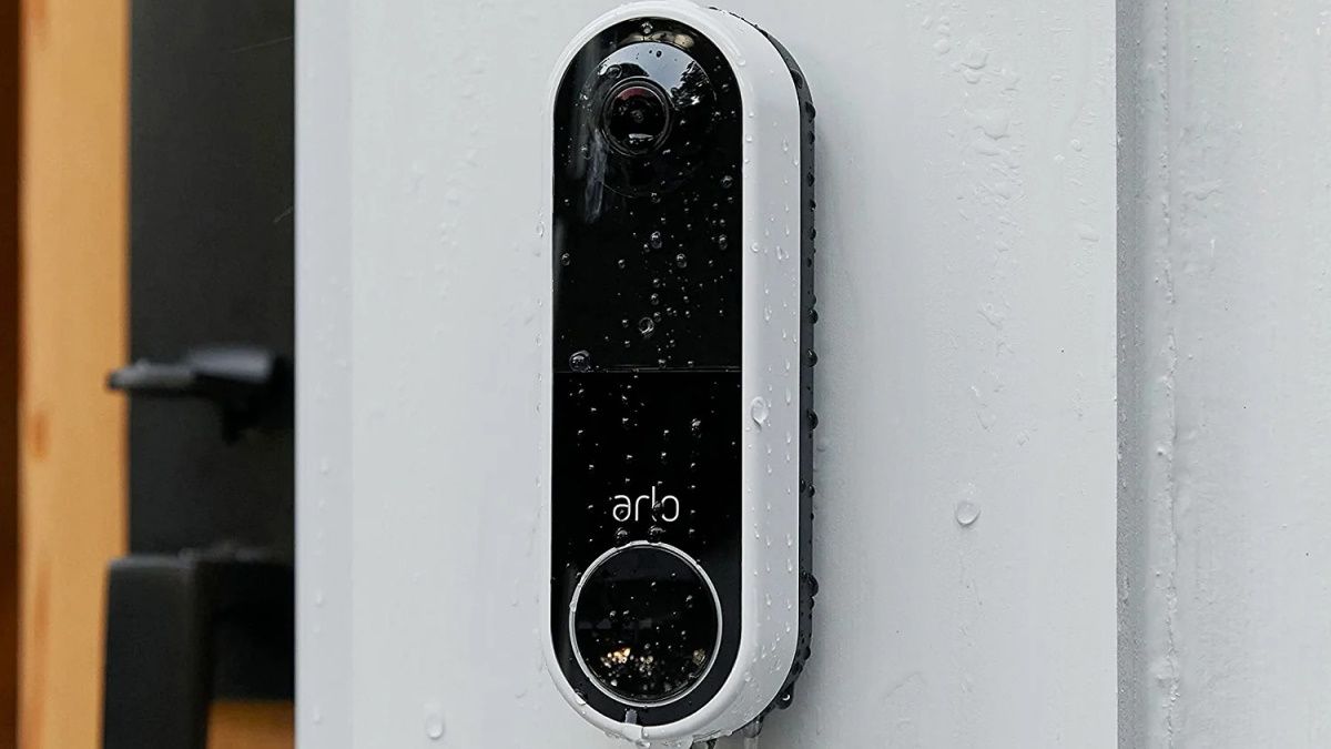 Arlo Essential Wire-Free Video Doorbell out in rain
