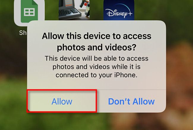 Tap "Allow" on the iPhone screen.
