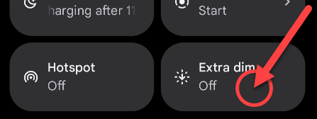 Long-press the "Extra Dim" tile.