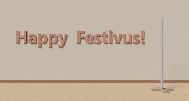 A sign that reads "Happy Festivus"