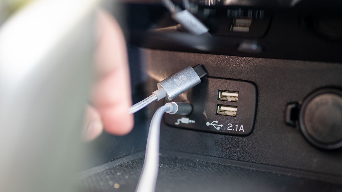 Cable Matters USB-C to 3.5mm aux plugged into a car