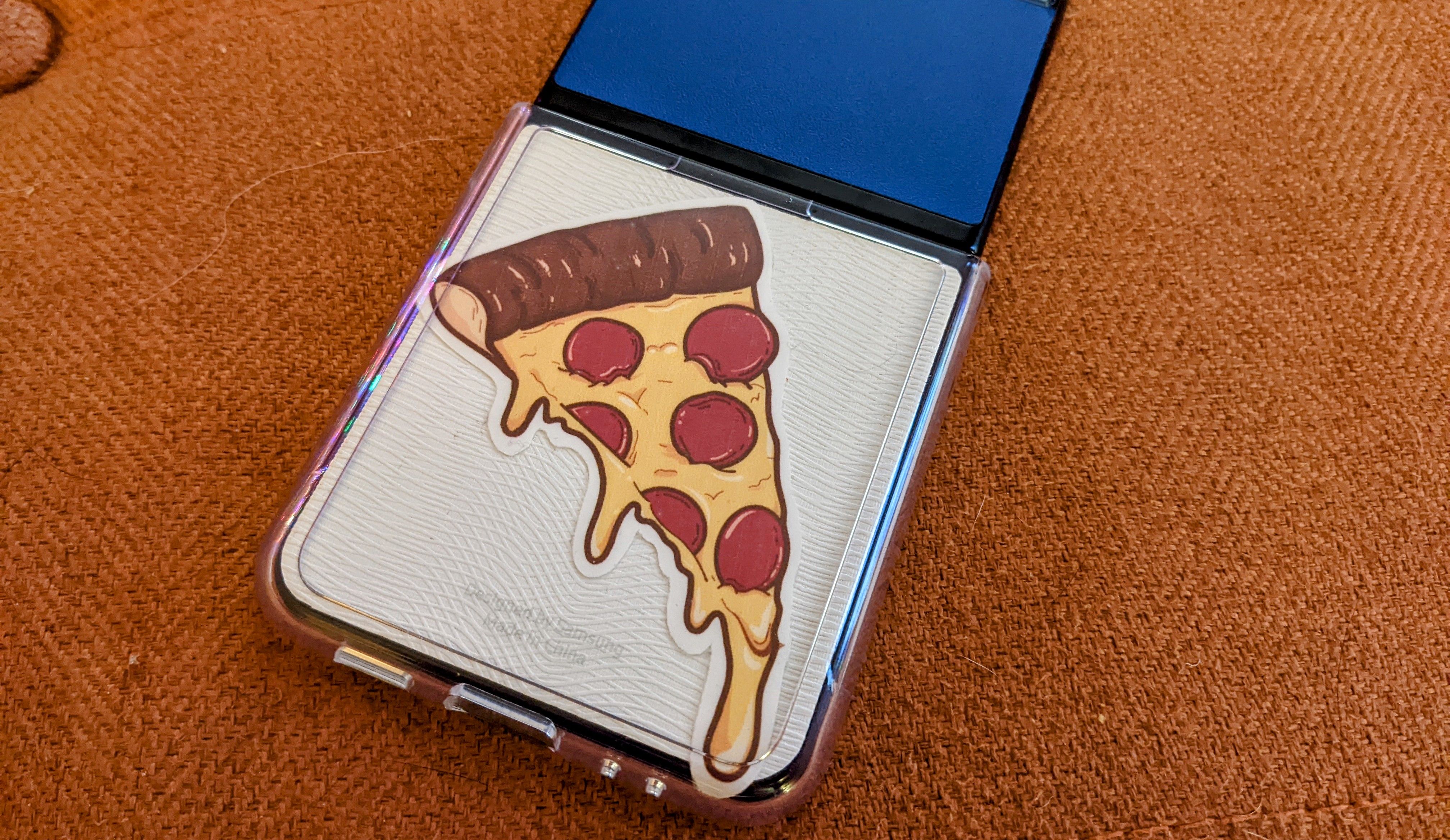 Pizza sticker on phone.
