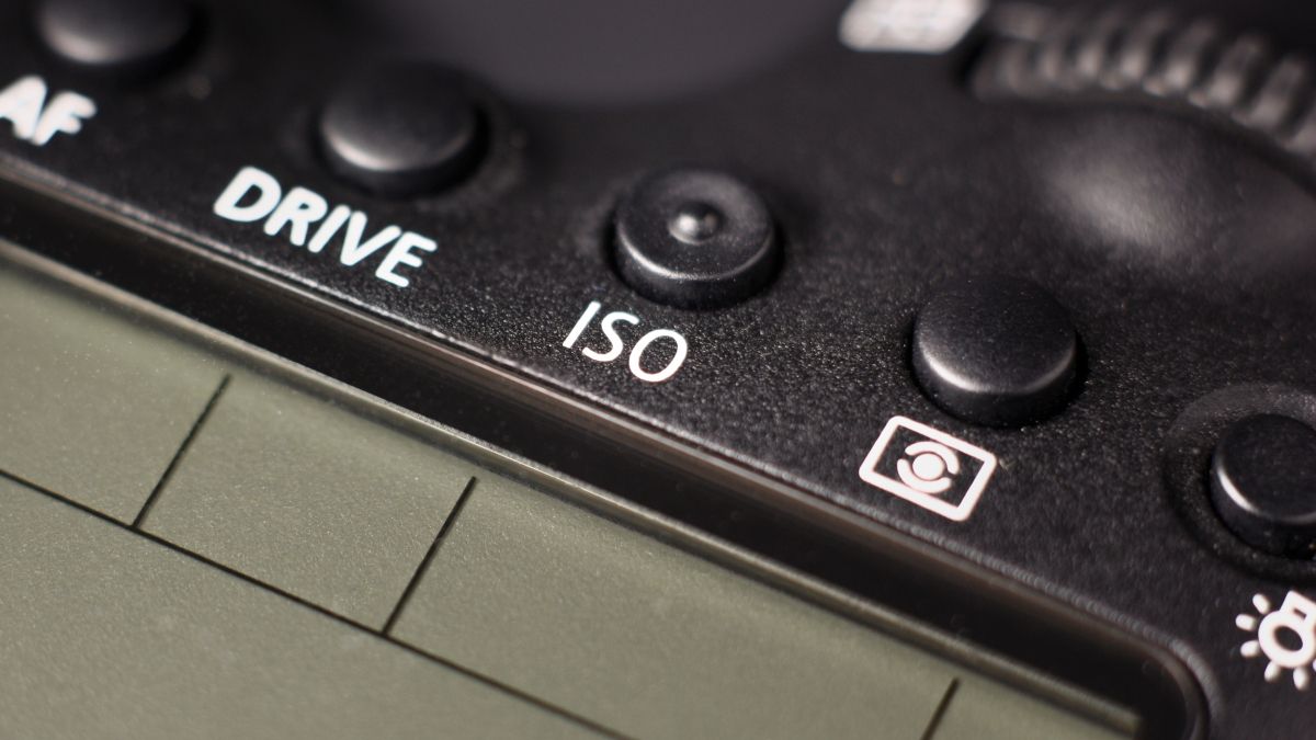 Closeup of a Canon 6D mark2 camera display with a focus on the ISO button.