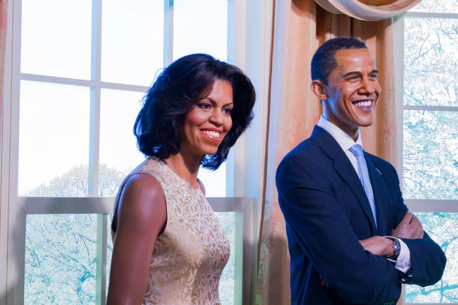 Wax replicas of Michelle and Barack Obama at a museum.