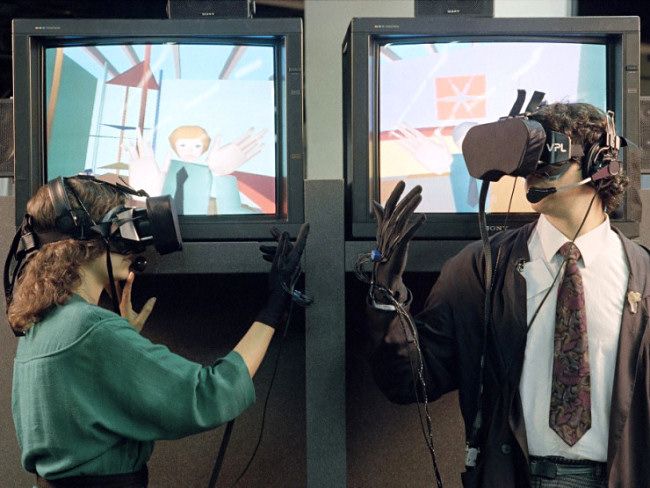 People demonstrating VPL virtual reality in the late 1980s.