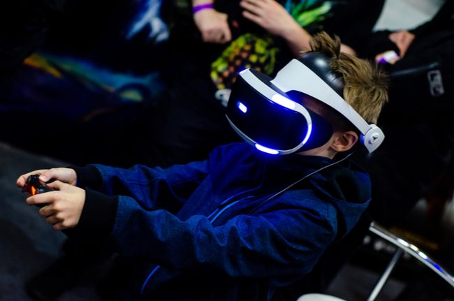 A child using a Sony PS VR headset.