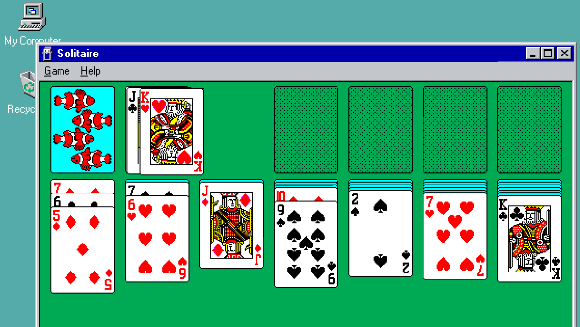 Playing classic Solitaire game on Windows 98.