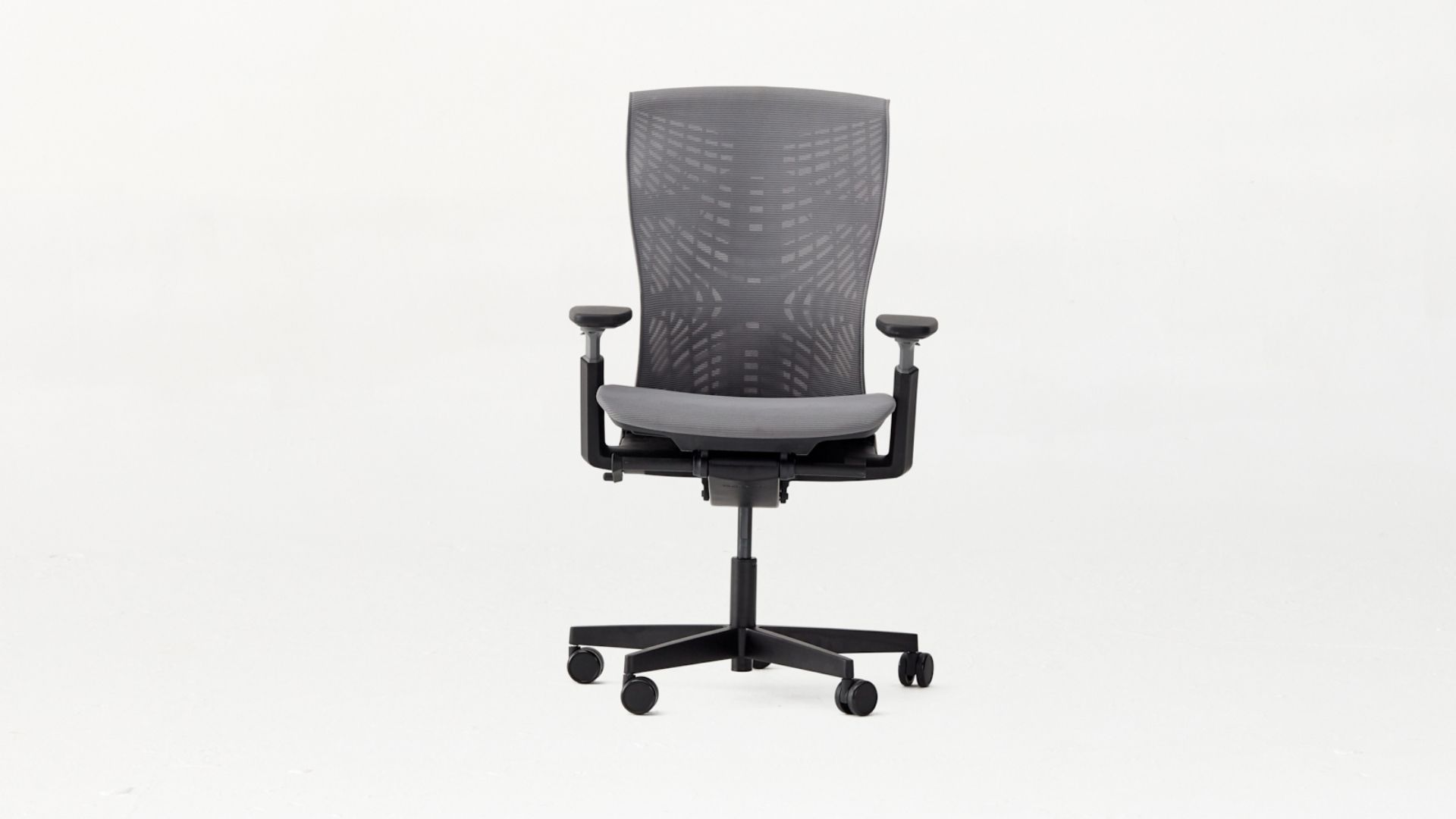 ErgoChair Pro+ ergonomic chair with gray upholstery and a mesh back for the office