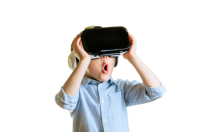 Young child with a surprised expression while wearing a VR headset.