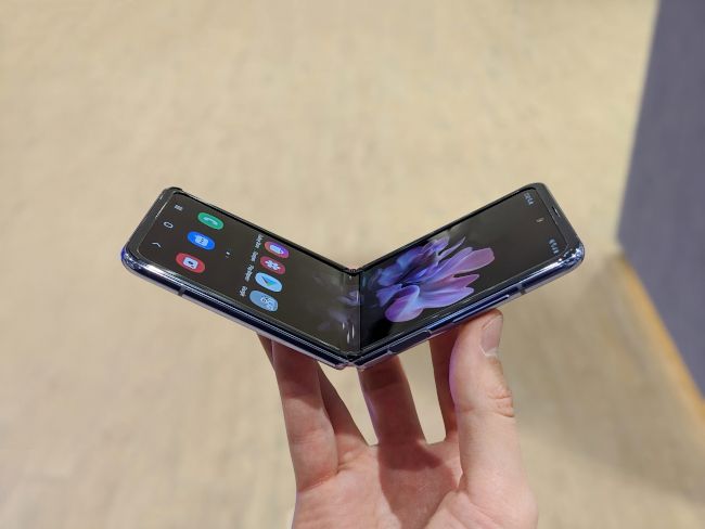 A partially closed Samsung Galaxy Z Flip smartphone.