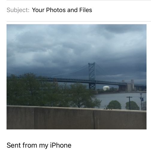 A photo attached to an email in Mail on iPhone.
