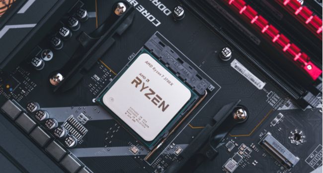 An AMD Ryzen 3700x processor on a motherboard.