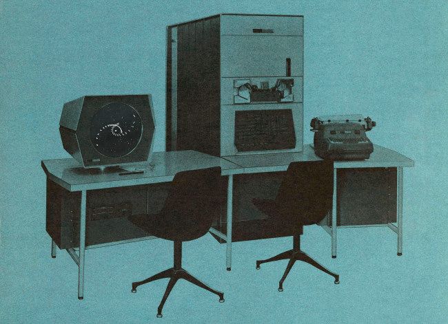 A DEC PDP-1 with Spacewar superimposed on the screen.