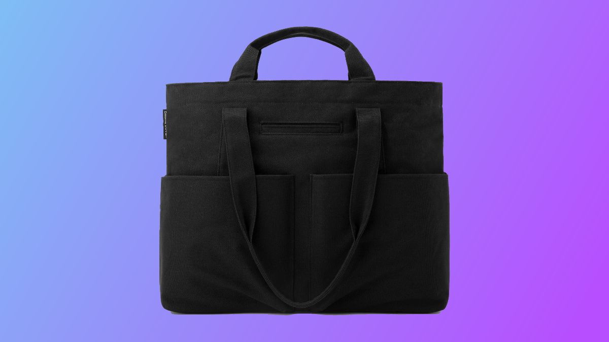 Dagne Dover tote on blue and purple background