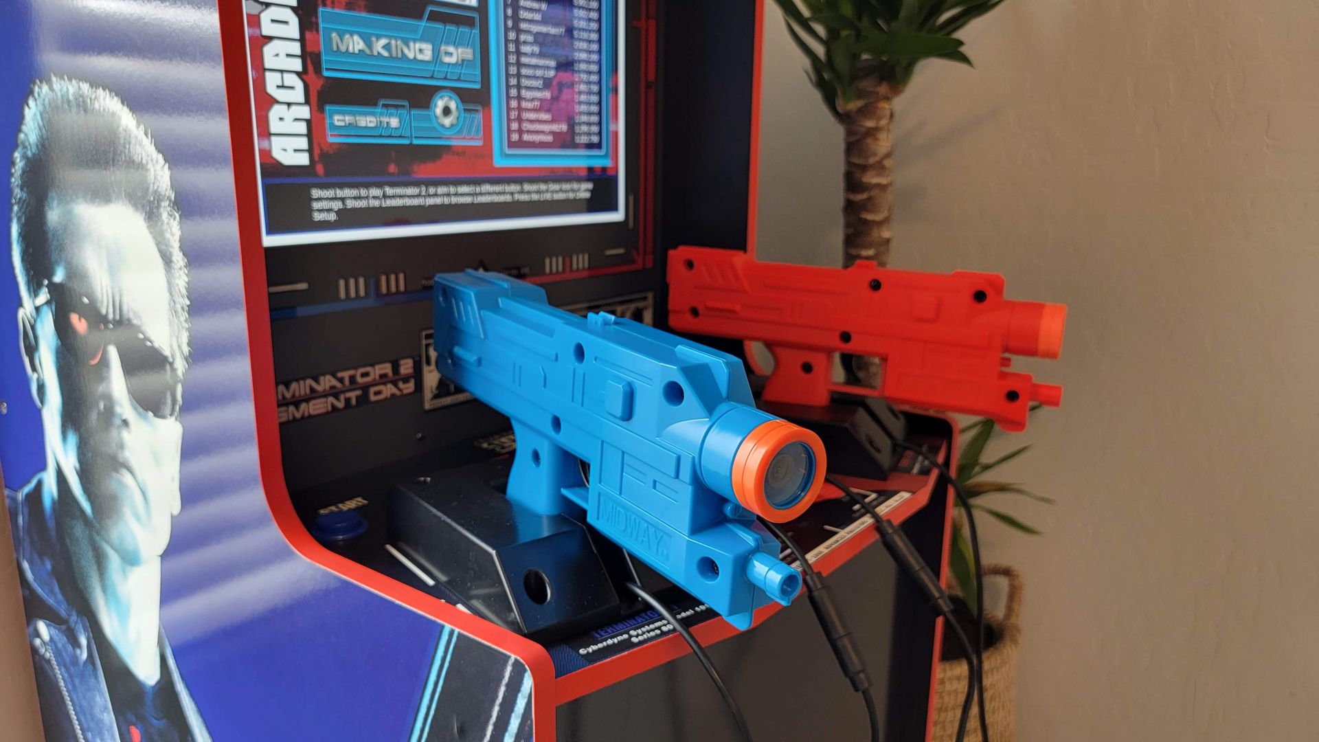 Terminator 2 arcade cabinet with light guns.