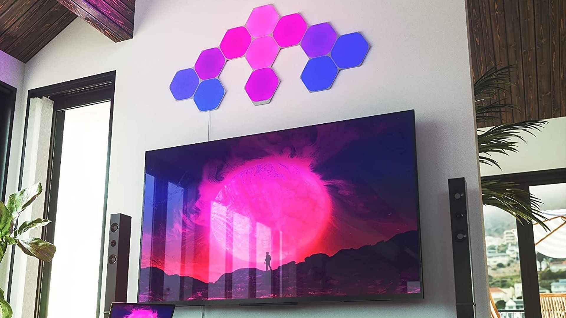 Nanoleaf Shapes Hexagons smart lighting above a TV