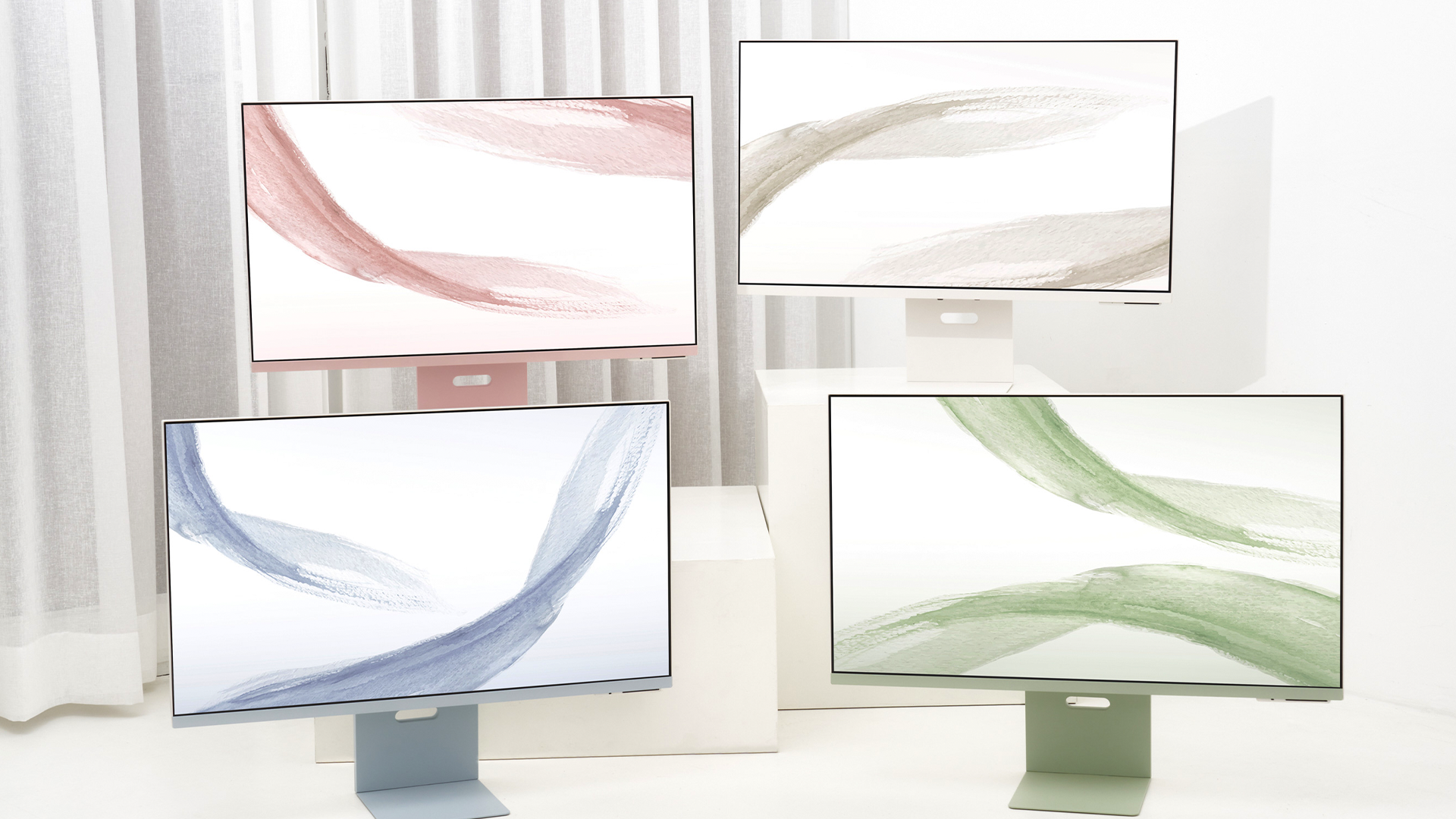 The Smart Monitor M8 in green, white, pink, and blue.