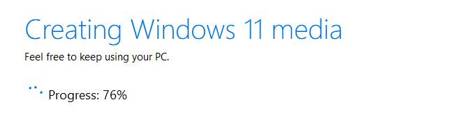 The tool will download the Windows 11 ISO.