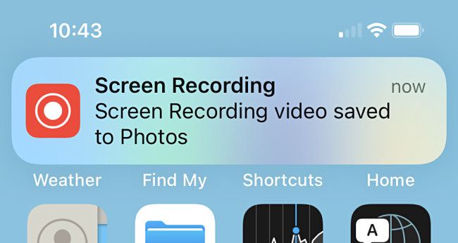 A confirmation on iPhone reading "Screen Recording video saved to Photos."