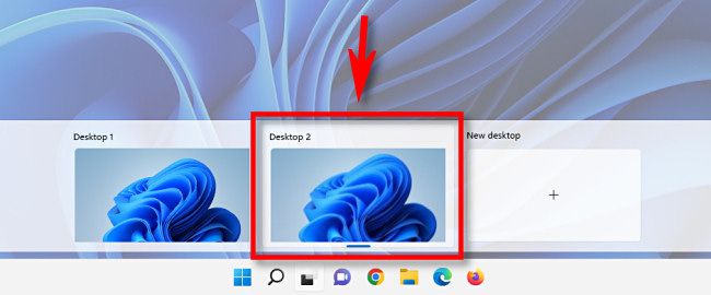 In Windows 11 Task View, select the virtual desktop thumbnail to switch to it.