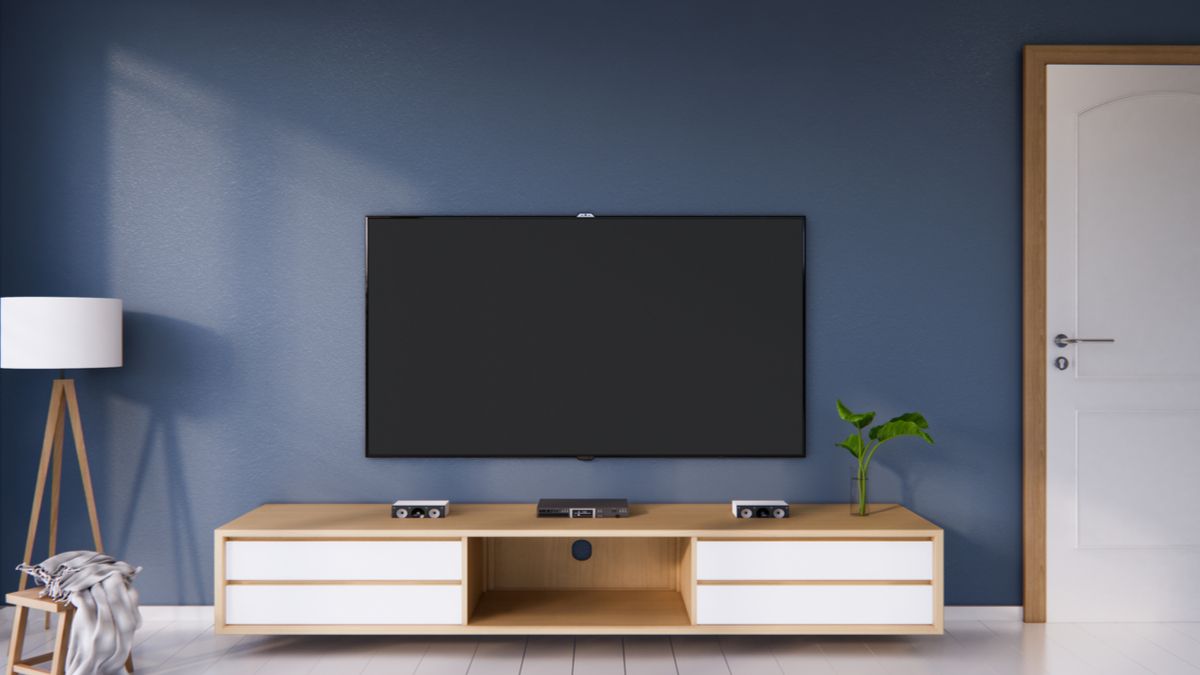 A large TV on a wall in a modern home.