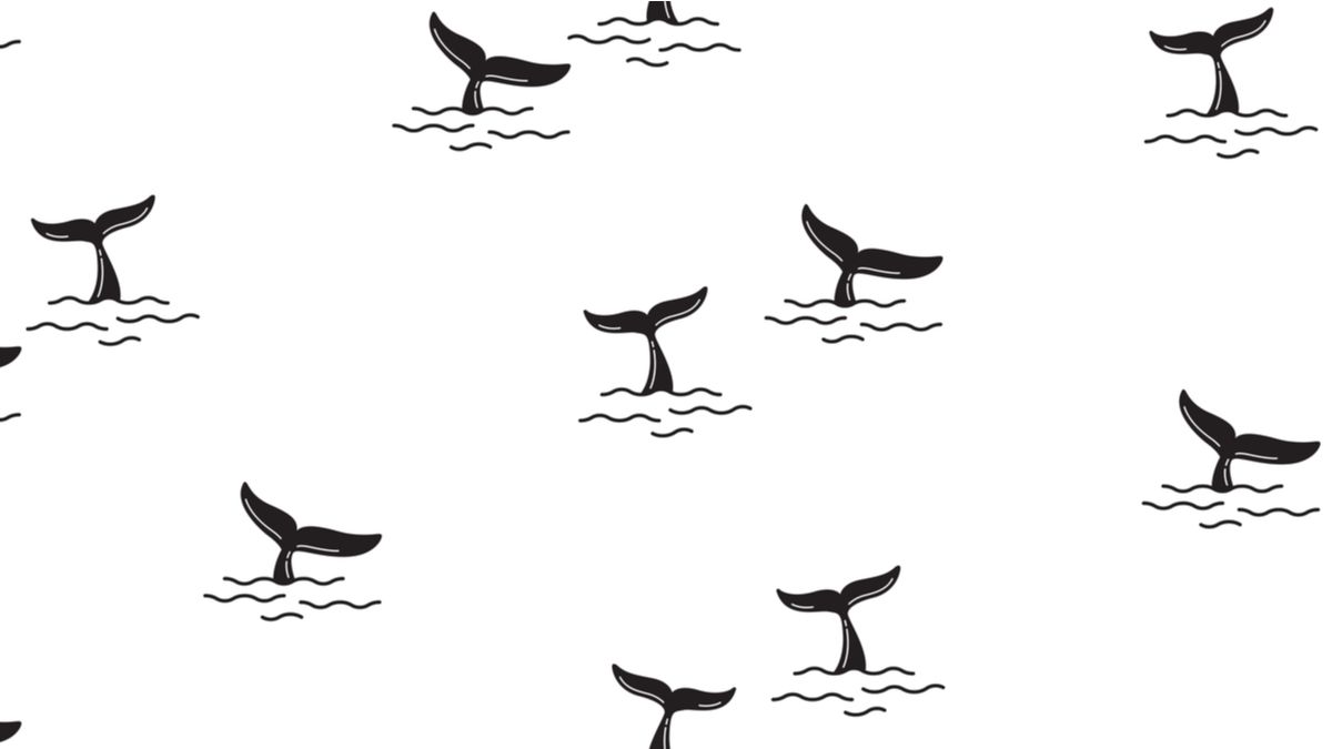 Pattern of whale fins raised out of the ocean.