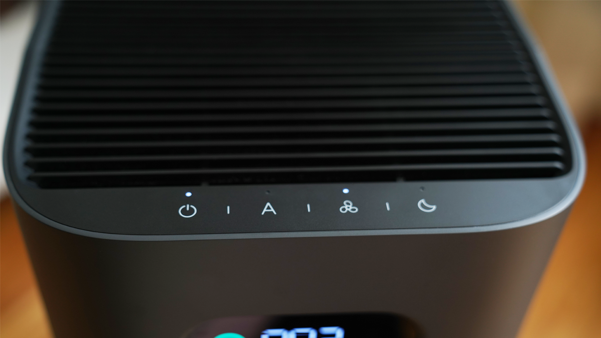 Close-up of the touch controls at the top of the Wyze Air Purifier