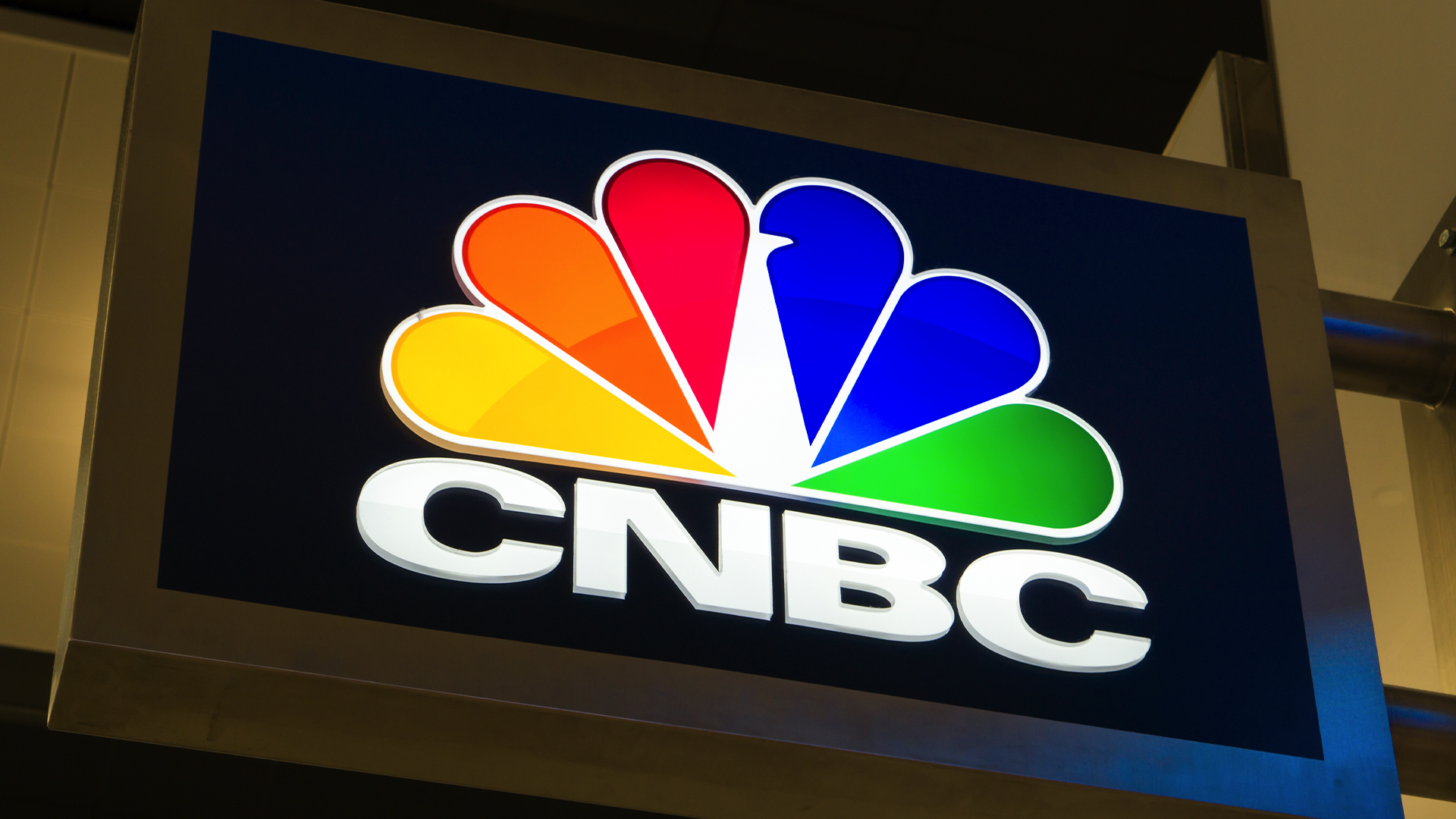 The CNBC logo on a big sign.
