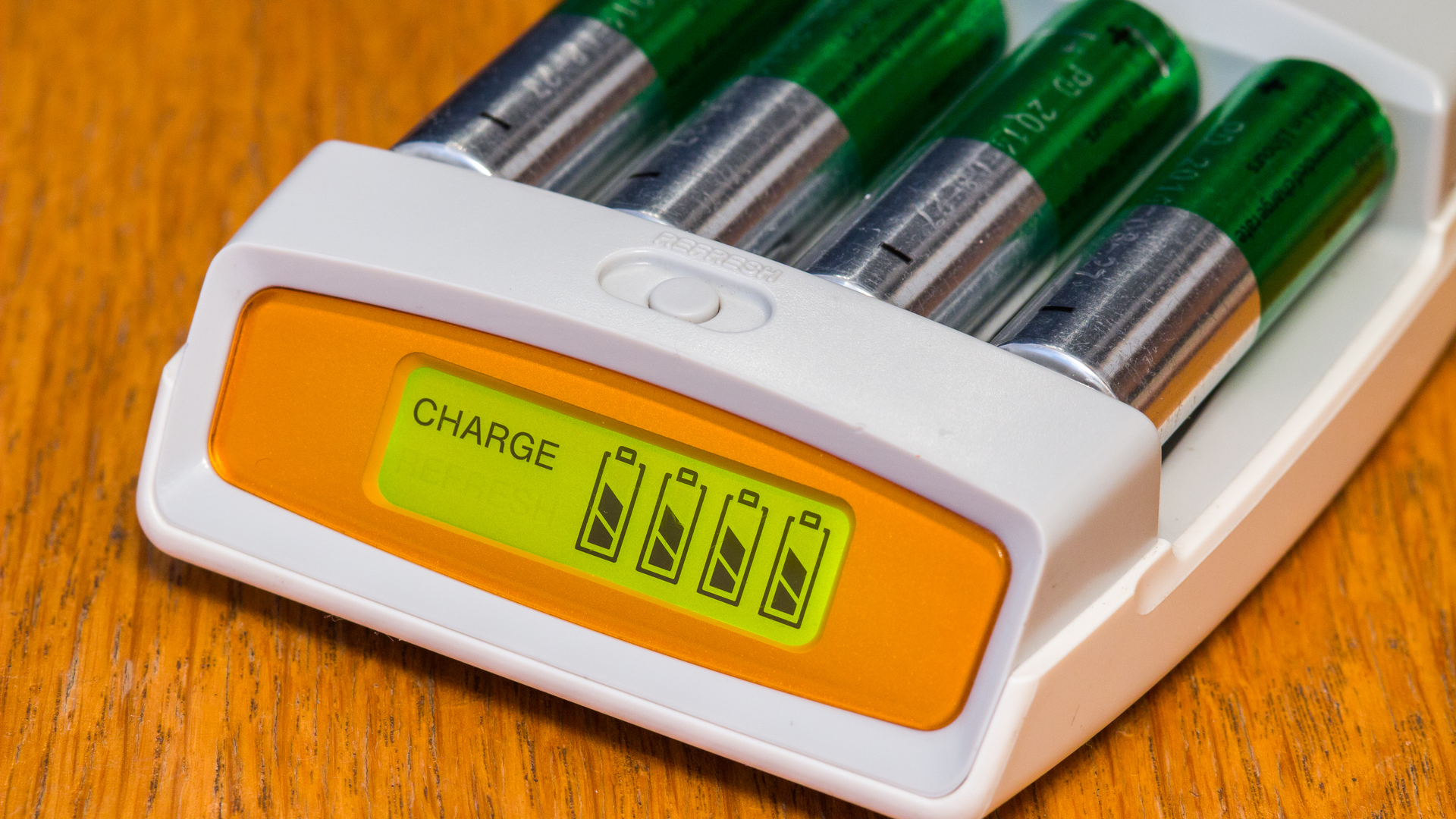 A set of rechargeable batteries in a charger